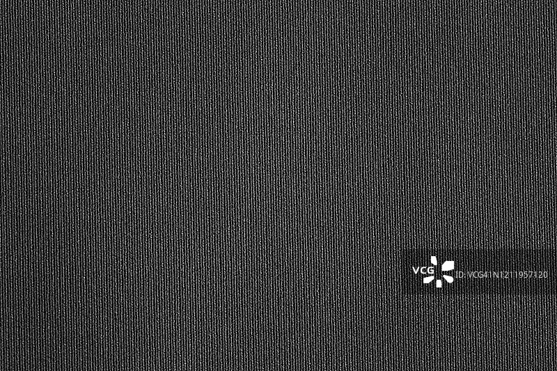 黑色织物纹理特写。纺织背景。图片素材