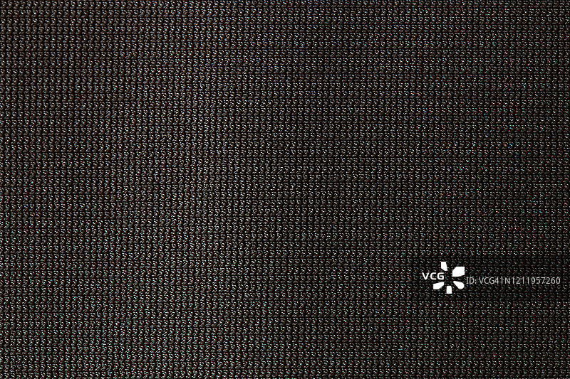 黑色织物纹理特写。纺织背景。图片素材