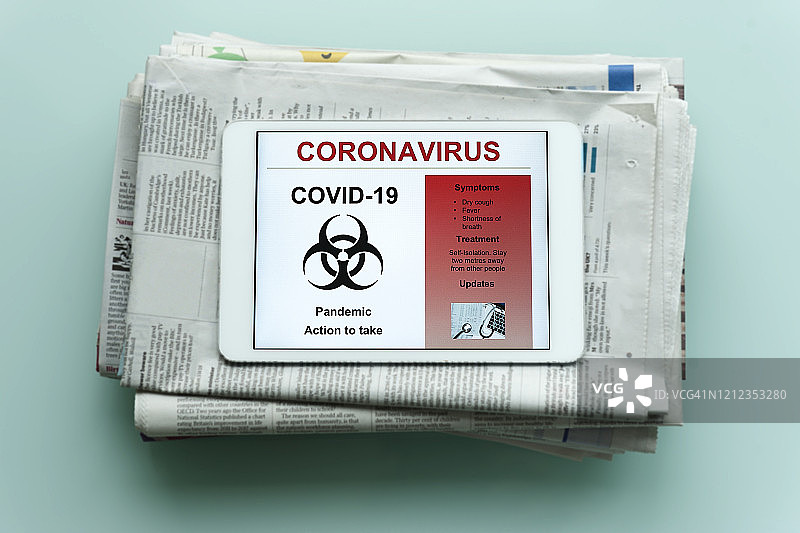 带有新冠病毒文本的数位板图片素材