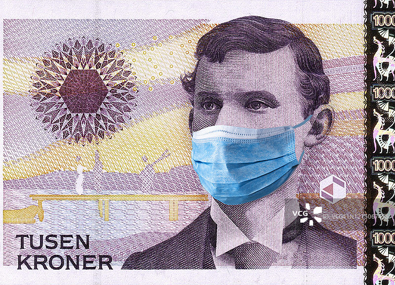 挪威隔离：带医用口罩的1000挪威克朗纸币，关于疫情和冠状病毒防护图片素材