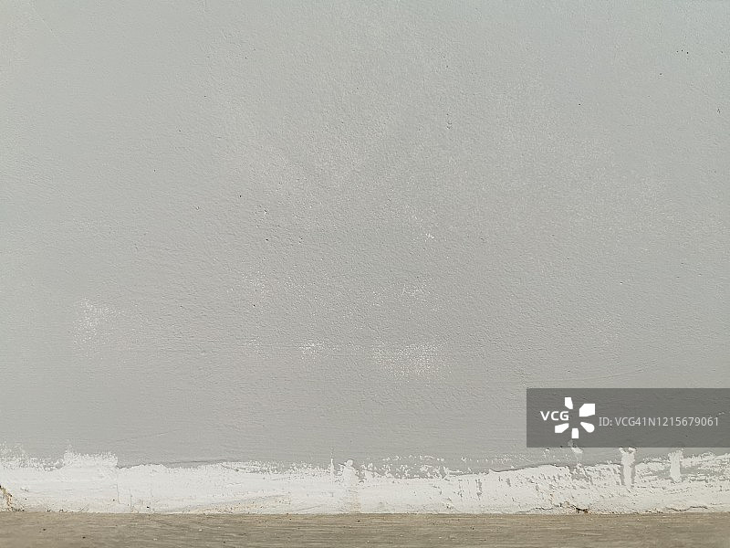 蓝灰色石膏墙底部的细节图片素材