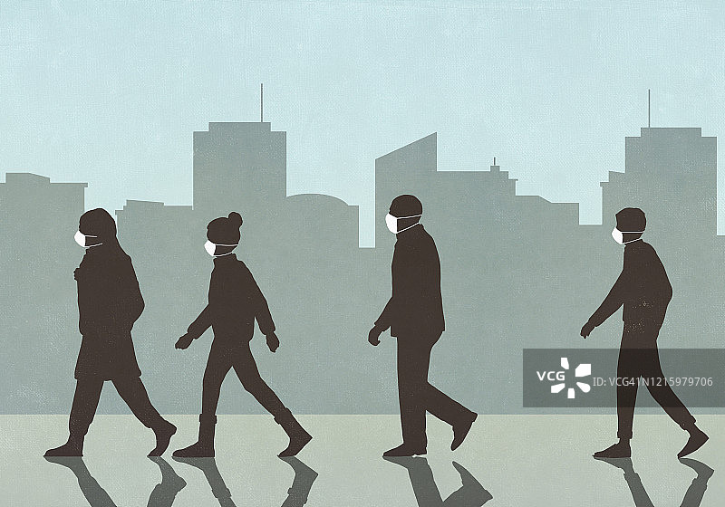戴着口罩在城市中行走的行人图片素材