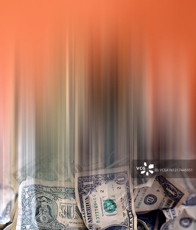 抽象的一美元钞票堆砌的赚钱概念图片素材