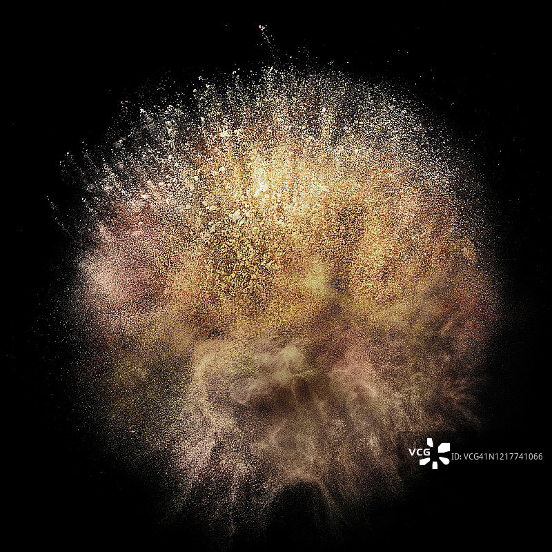 黑色背景上彩色粉底爆炸的俯视特写图片素材