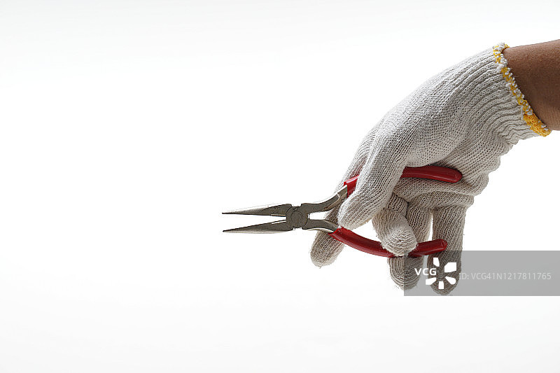 手持尖嘴钳图片素材