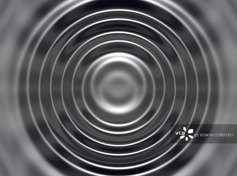 灰色背景上的流动液体特写图片素材