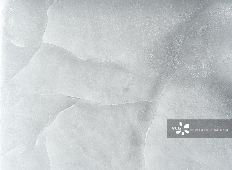 布满裂纹的冰块纹理特写图片素材