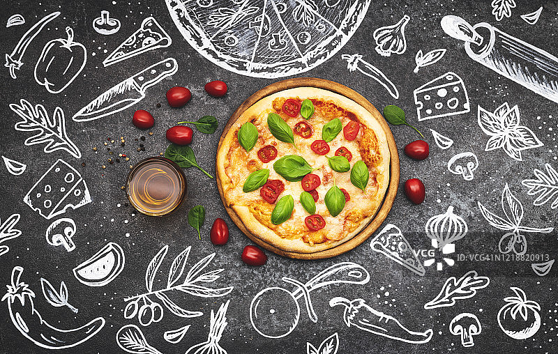 深色背景上手绘粉笔披萨草图，顶视图图片素材