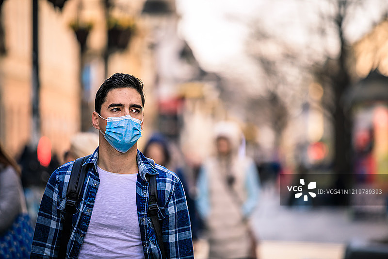 男人戴着防污染口罩，ป้องกันไวรัส图片素材