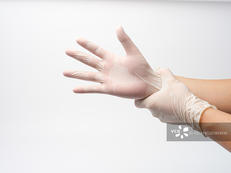 戴塑料手套图片素材