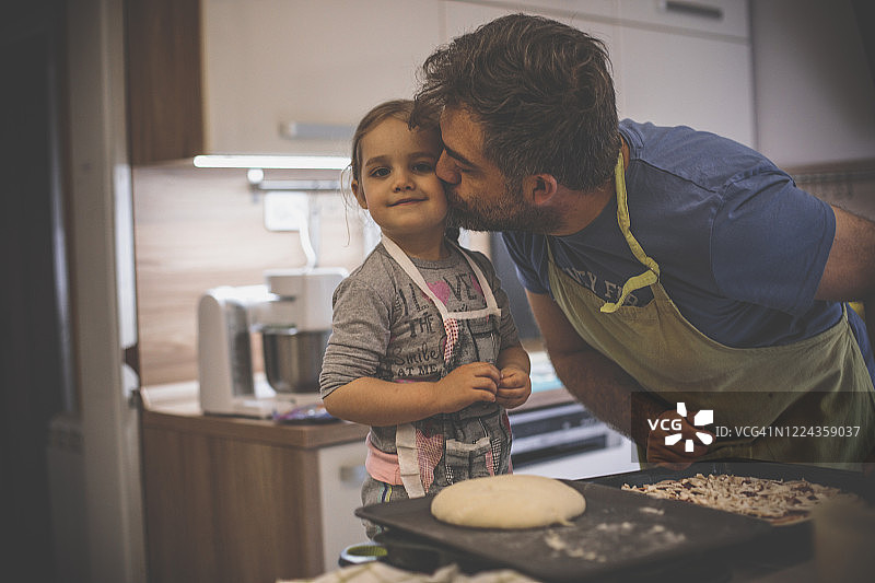 奖励小披萨厨师的一个吻图片素材