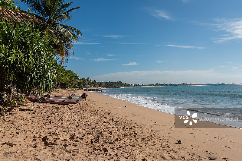 斯里兰卡坦加勒梅达克提亚海滩：田园诗般的天堂海滩图片素材