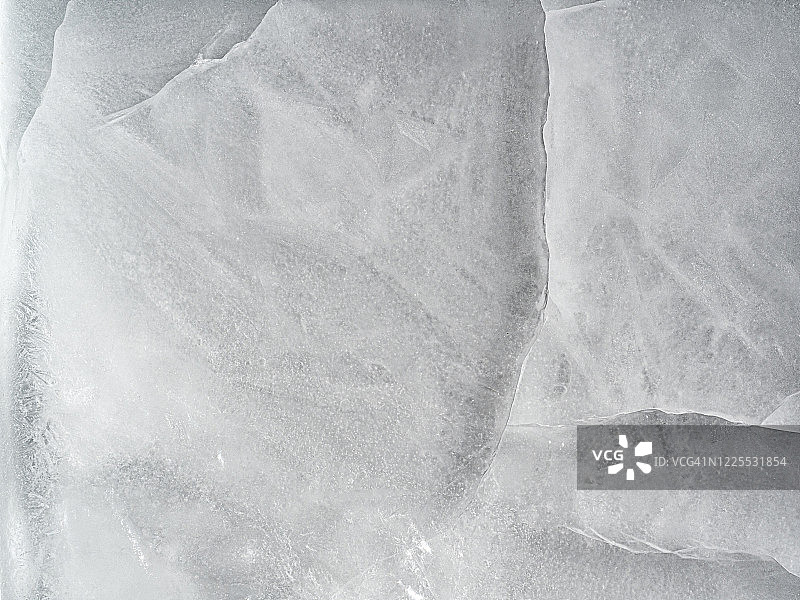 布满裂纹的冰块纹理特写图片素材