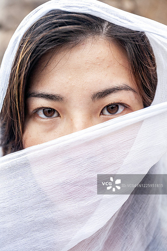泰国：戴着面巾的肖像图片素材