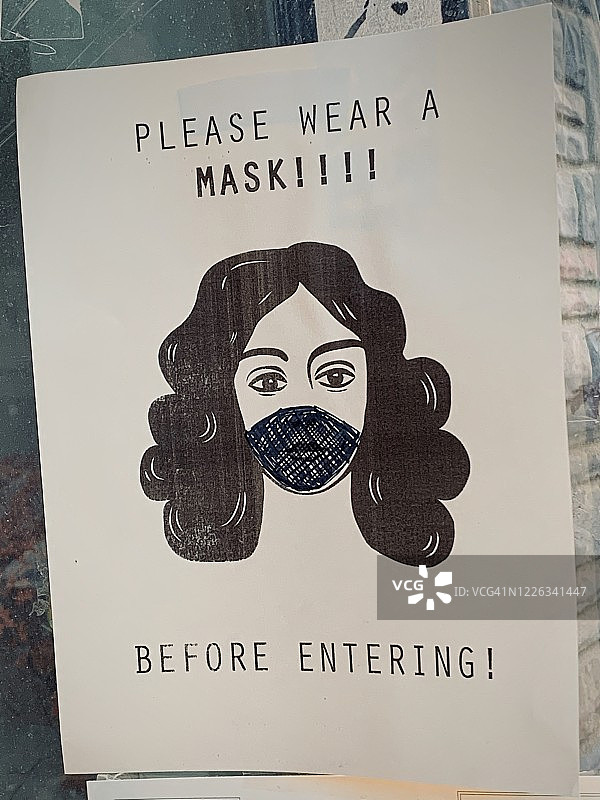 新冠疫情期间商店橱窗上的信息标牌图片素材