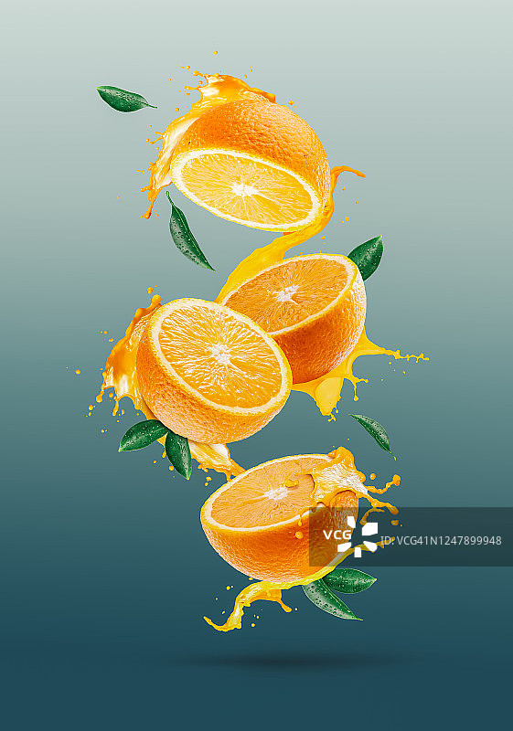 橙子切片飞溅出的橙汁图片素材