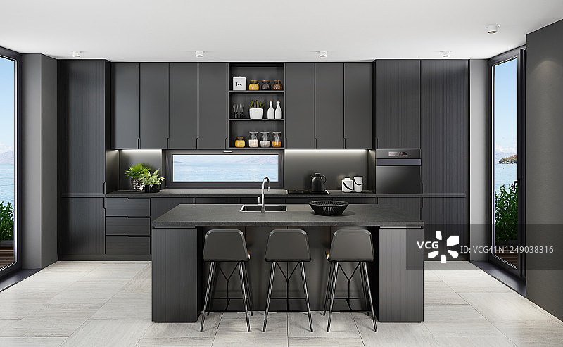 海边背景的带岛台的豪华哑光黑色厨房图片素材