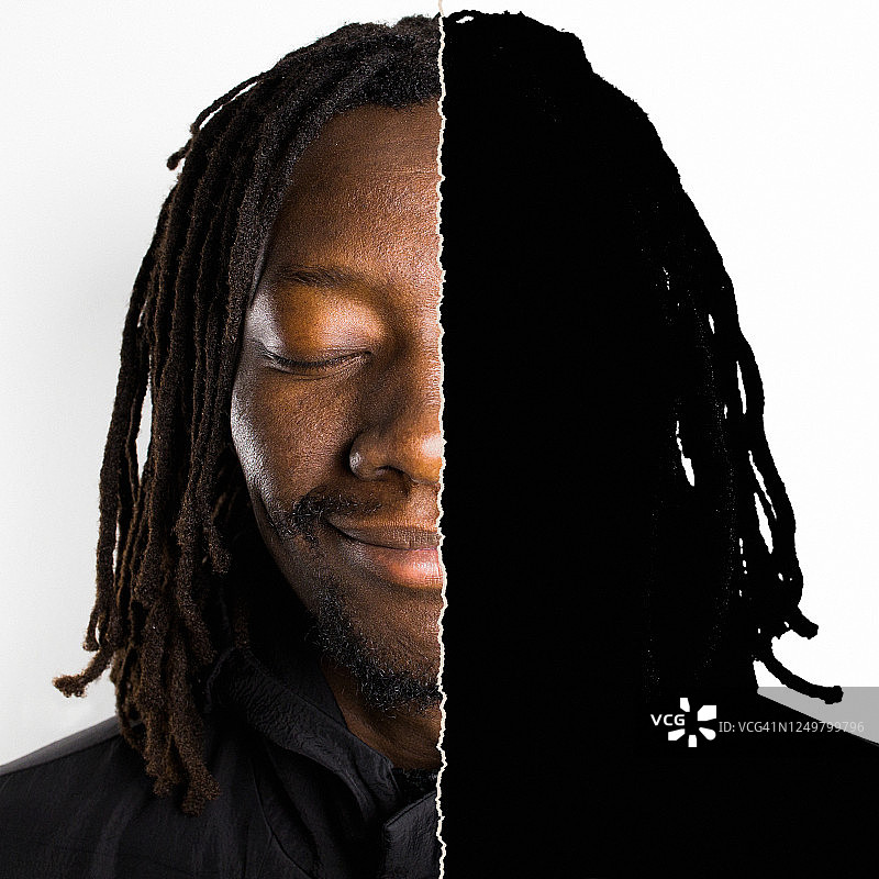 年轻男人面部轮廓显露的撕裂肖像图片素材