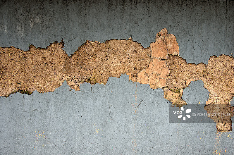 灰泥混凝土建筑外墙，浅灰色油漆剥落风化图片素材