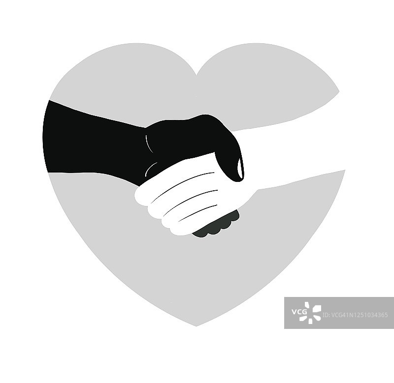 不同种族的两人（白人和黑人）握手图片素材