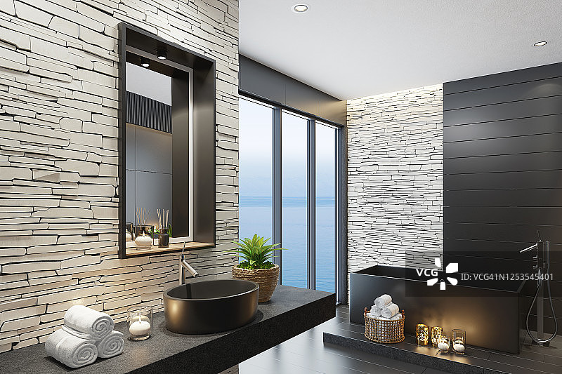 带哑光白色堆叠石墙和黑色哑光方形镜的豪华现代家庭水疗浴室图片素材