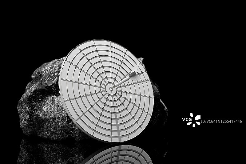 白色飞镖击中黑色石板图片素材