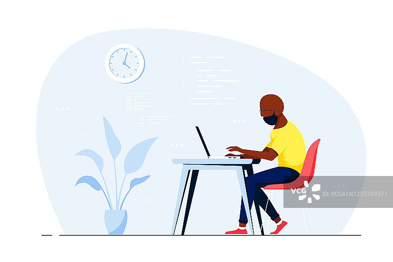 在办公室里用电脑工作的年轻黑人男子图片素材