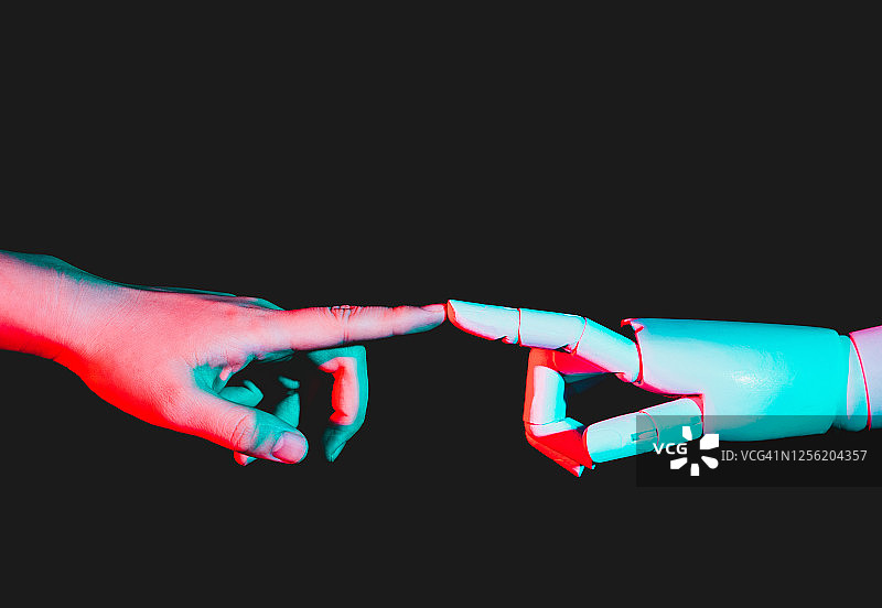 人手伸向机械手图片素材