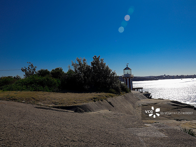 澳大利亚新南威尔士州悉尼的白色红色灯塔图片素材