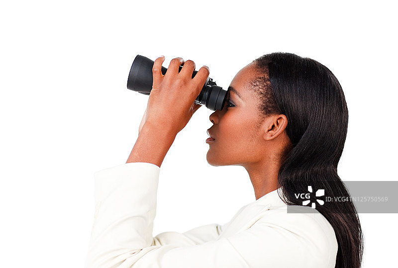富有魅力的女商人用双筒望远镜展望未来图片素材