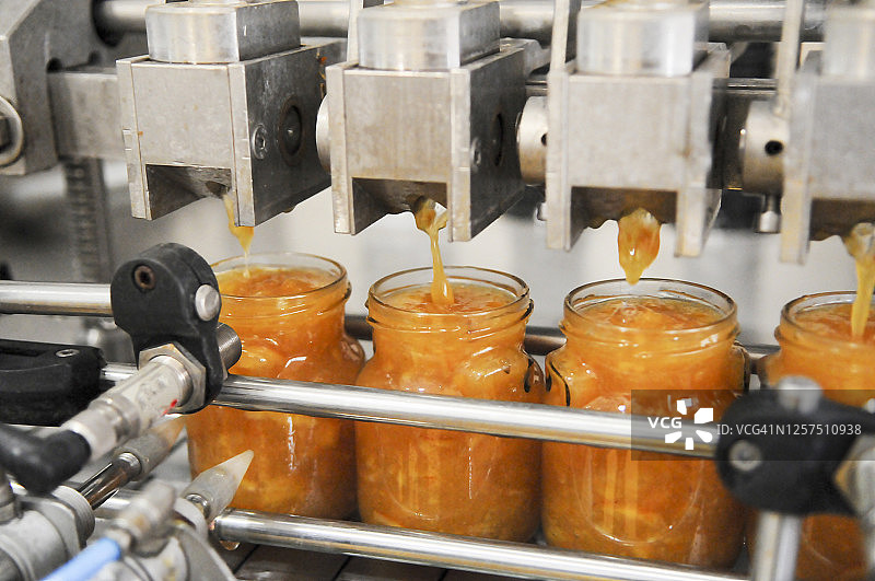 蜜饯装瓶机械图片素材