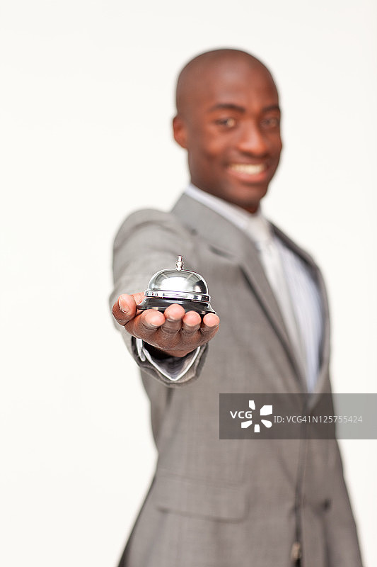 商人手持酒店门铃图片素材