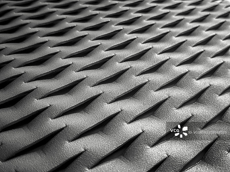 模切纹理金属板的特写透视照片图片素材