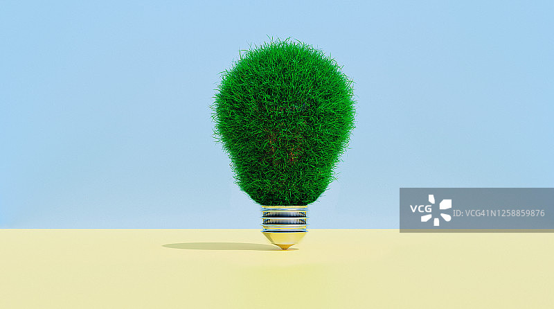 覆盖草地的灯泡，绿色思考概念图片素材