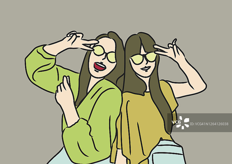 两位女士做出V手势图片素材