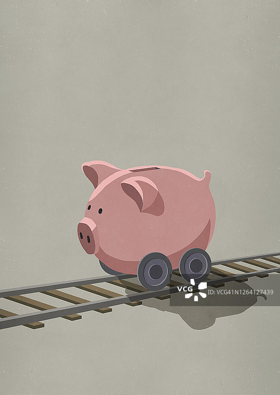 在铁轨上行驶的轮式储蓄罐图片素材