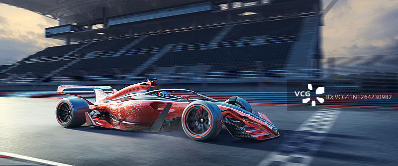 赛车在看台附近飞速驶过赛道终点线图片素材