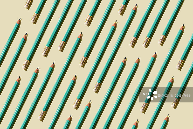 粉色背景上的许多铅笔图片素材