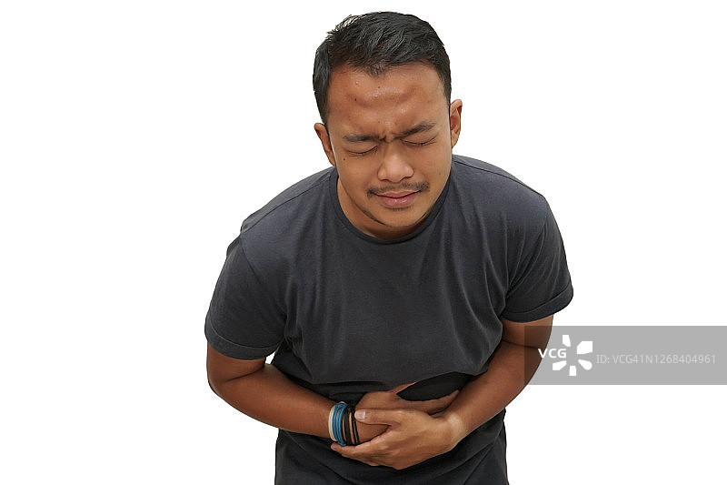 胃痛的年轻男子肖像图片素材