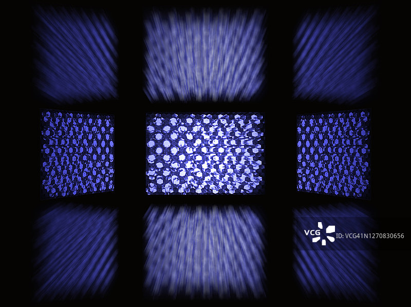 蜂窝状金属网格的倒影图片素材