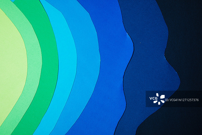 彩色纸张抽象背景—绿色和蓝色渐变图片素材