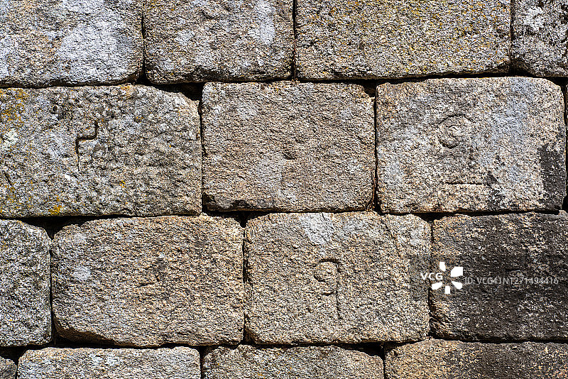 墙石上雕刻的砖石符号，葡萄牙图片素材