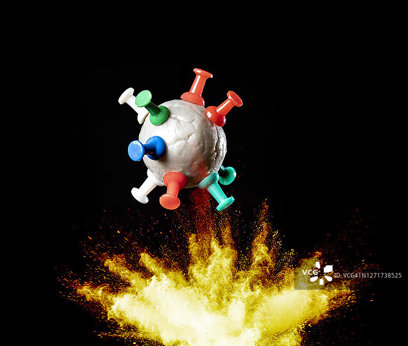 冠状病毒COVID-19爆炸的概念病毒设计，黑色背景图片素材