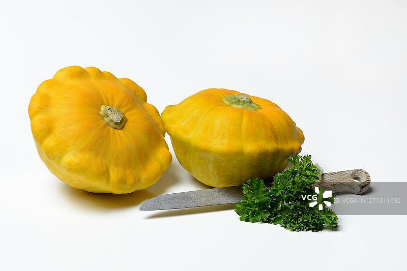德国的黄色小南瓜与欧芹和厨刀图片素材