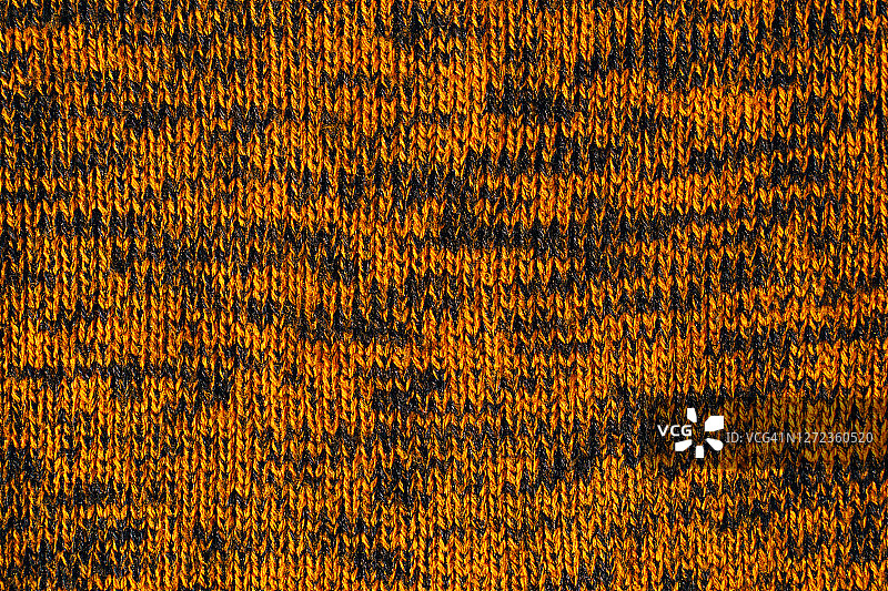 橙色和黑色针织纹理特写背景图片素材