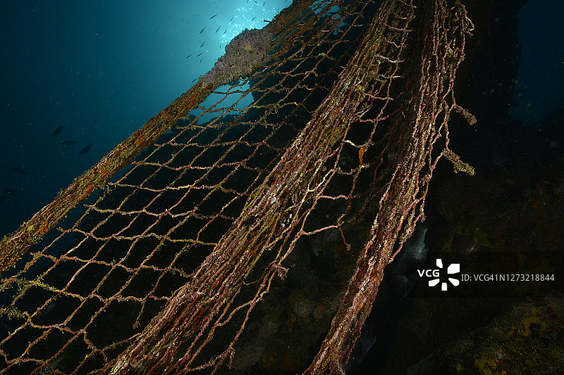 礁石上的渔网图片素材