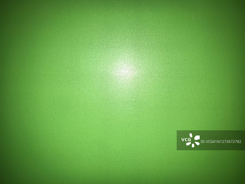 侧面光照下的哑光墙面纹理图片素材