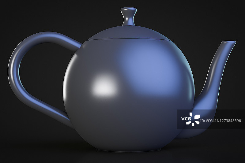 黑色背景上的黑色陶瓷茶壶特写图片素材