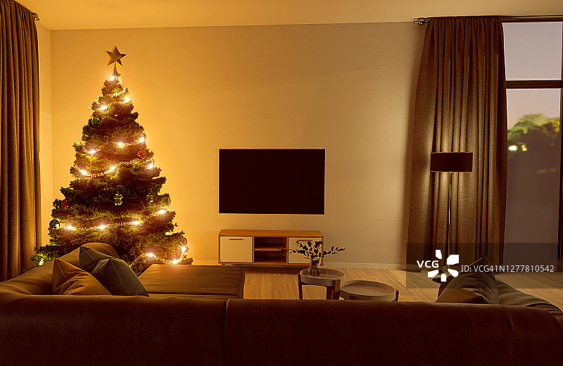 客厅里的圣诞树和平板电视图片素材