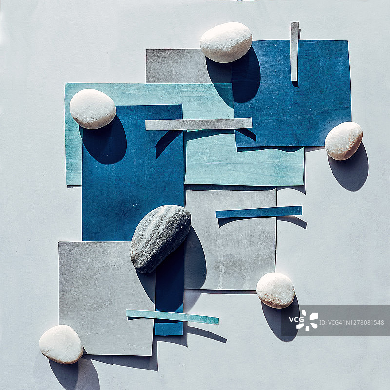 蓝灰色纸张和石头拼贴几何图案图片素材